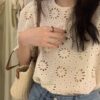 花朵蕾絲壓紋鏤空洞洞澎袖上衣