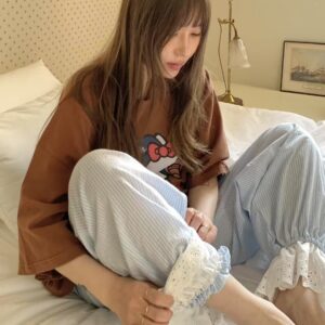 蕾絲邂逅拼接條紋長褲